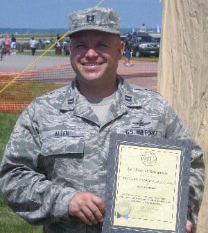 Capt. Christopher Allen of the Rhode Island National Guard, 281st Combat Communications Group, receives his AFCEA Lifetime Membership certificate at the Rhode Island Air Show in June.
